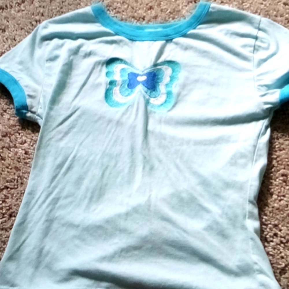 A short sleeve shirt, blue.